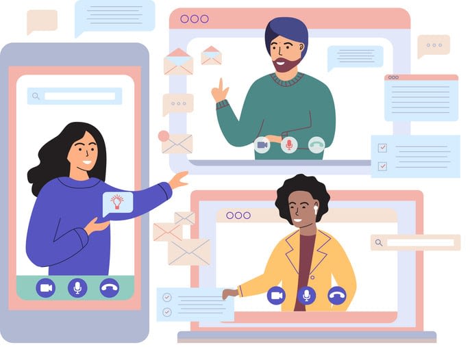 Computer with group of colleagues taking part in video conference