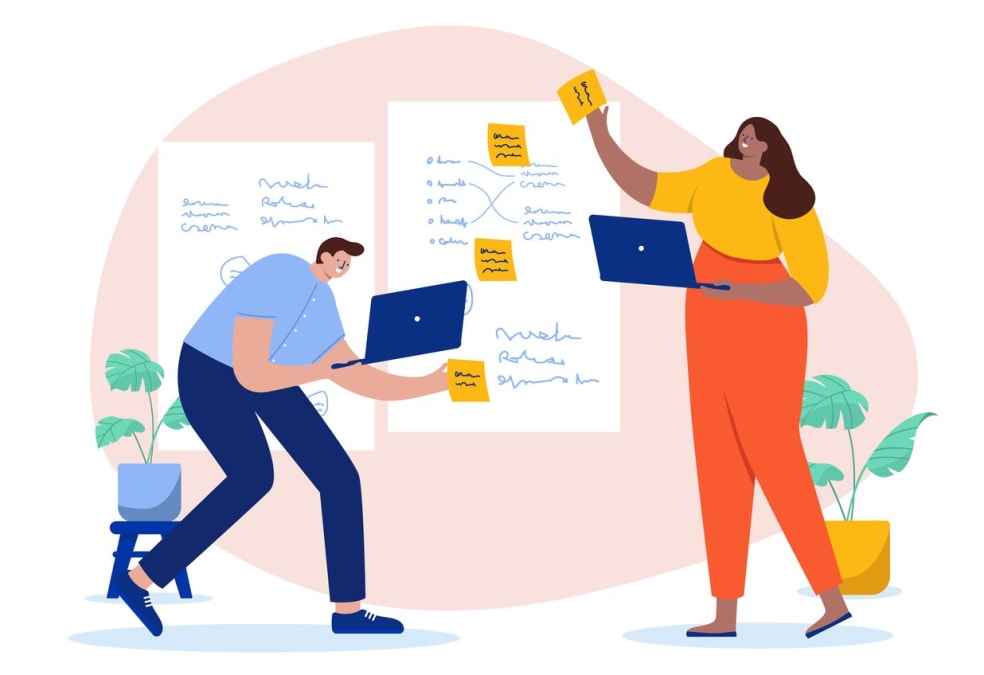 two-business-people-working-on-project-planning